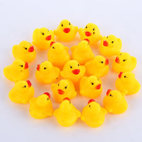 100pcs/lot Squeaky Rubber Duck Duckie Bath Toys Baby Shower Water Toys for baby Children Birthday Favors Gift free shipping